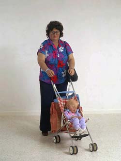 Woman with Child in a Stroller
